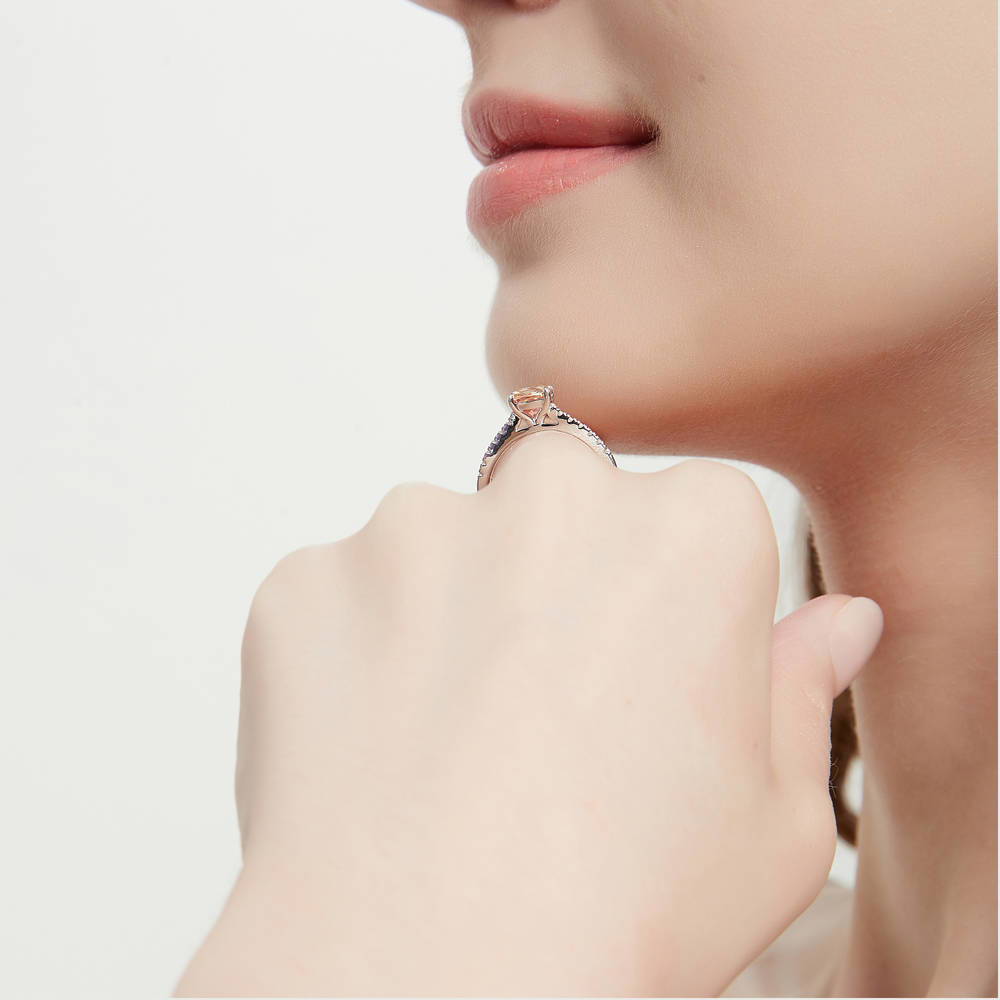 Model wearing Solitaire Kaleidoscope Red Orange CZ Ring in Sterling Silver, 3 of 8