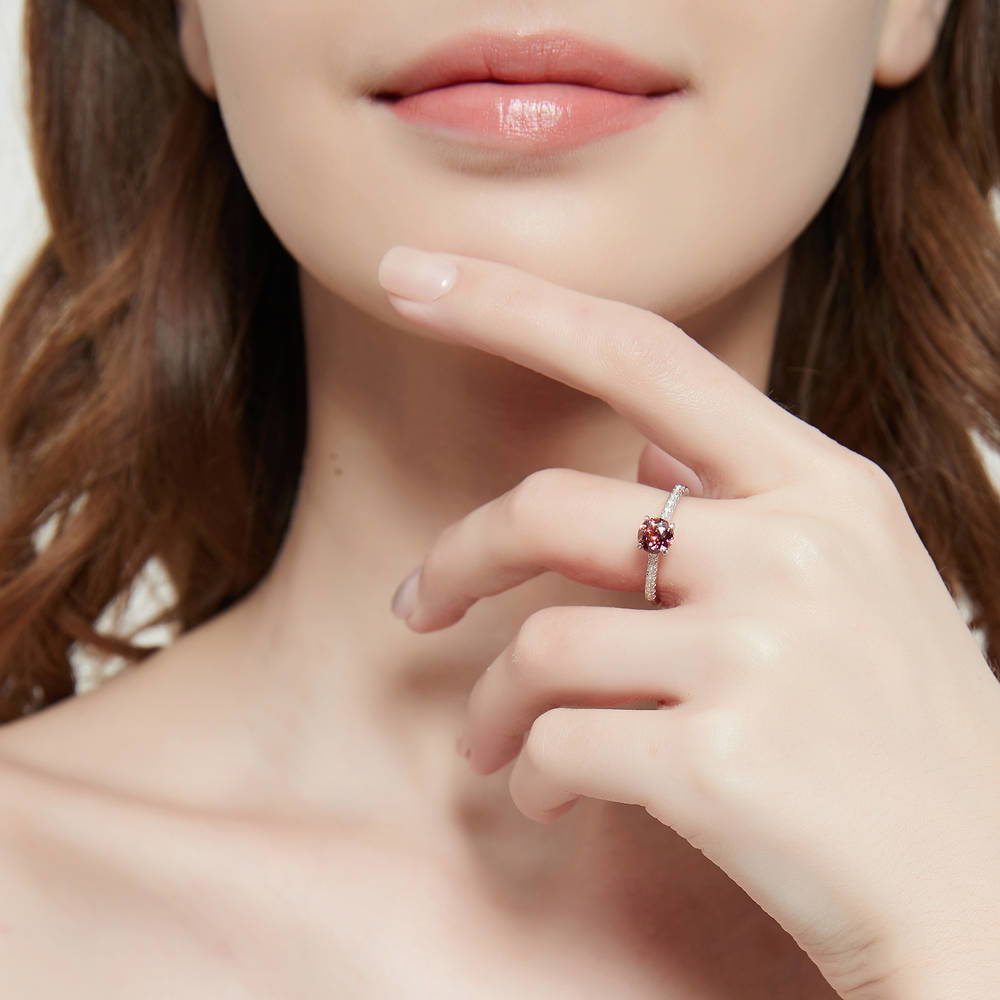 Model wearing Solitaire Kaleidoscope Red Orange CZ Ring in Sterling Silver, 2 of 8