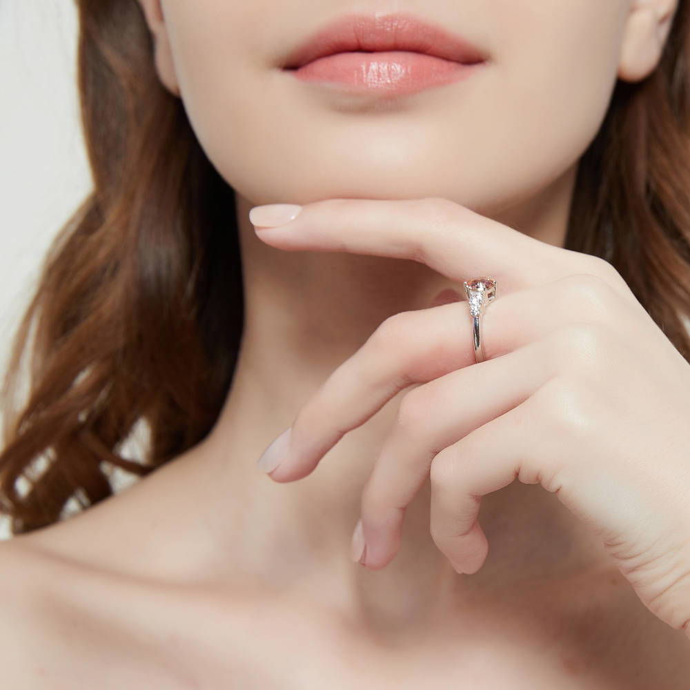 Model wearing Solitaire Kaleidoscope Red Orange CZ Ring in Sterling Silver, 6 of 8
