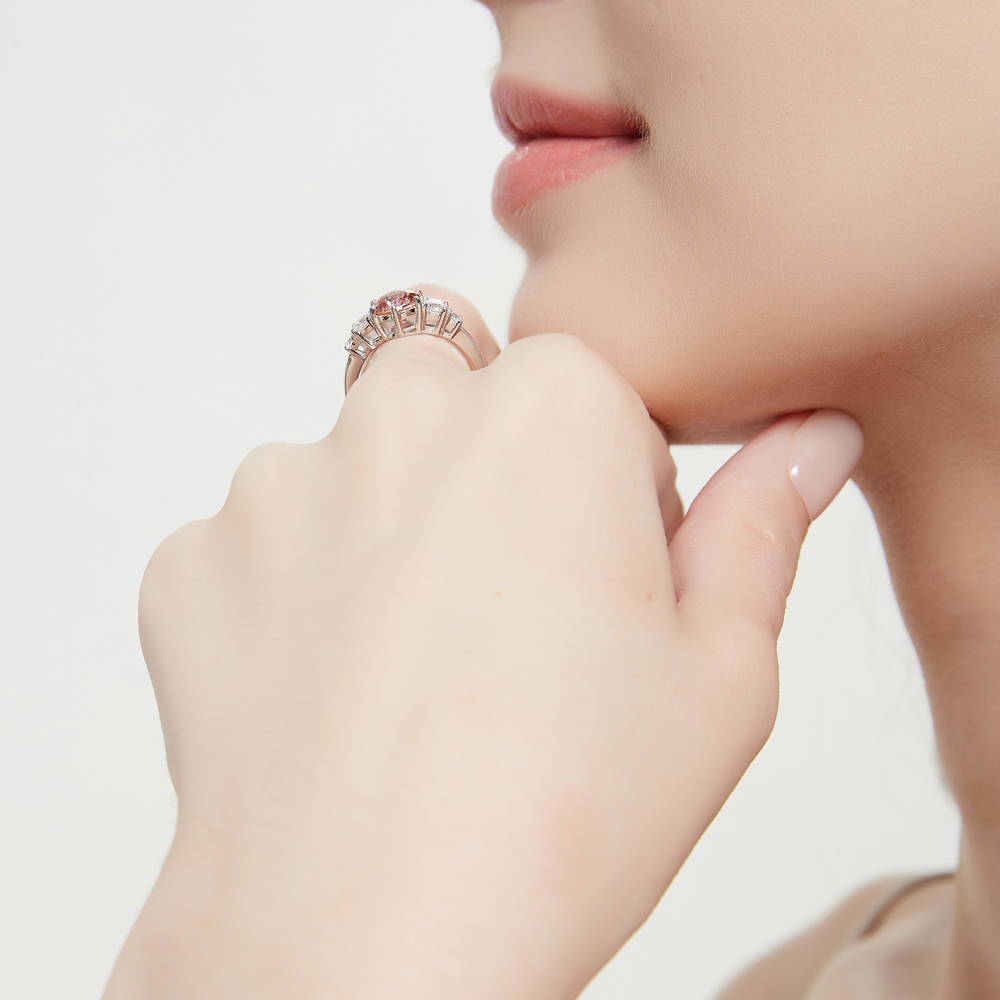Model wearing Solitaire Kaleidoscope Red Orange CZ Ring in Sterling Silver, 3 of 8
