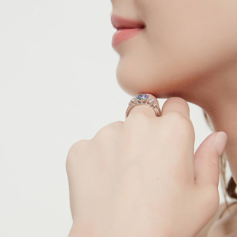 Model wearing Solitaire Kaleidoscope Purple Aqua CZ Ring in Sterling Silver, 3 of 8