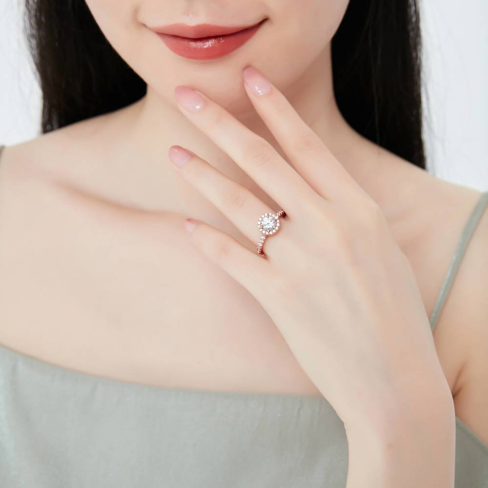 Model wearing Halo Round CZ Ring in Rose Gold Plated Sterling Silver, 2 of 8