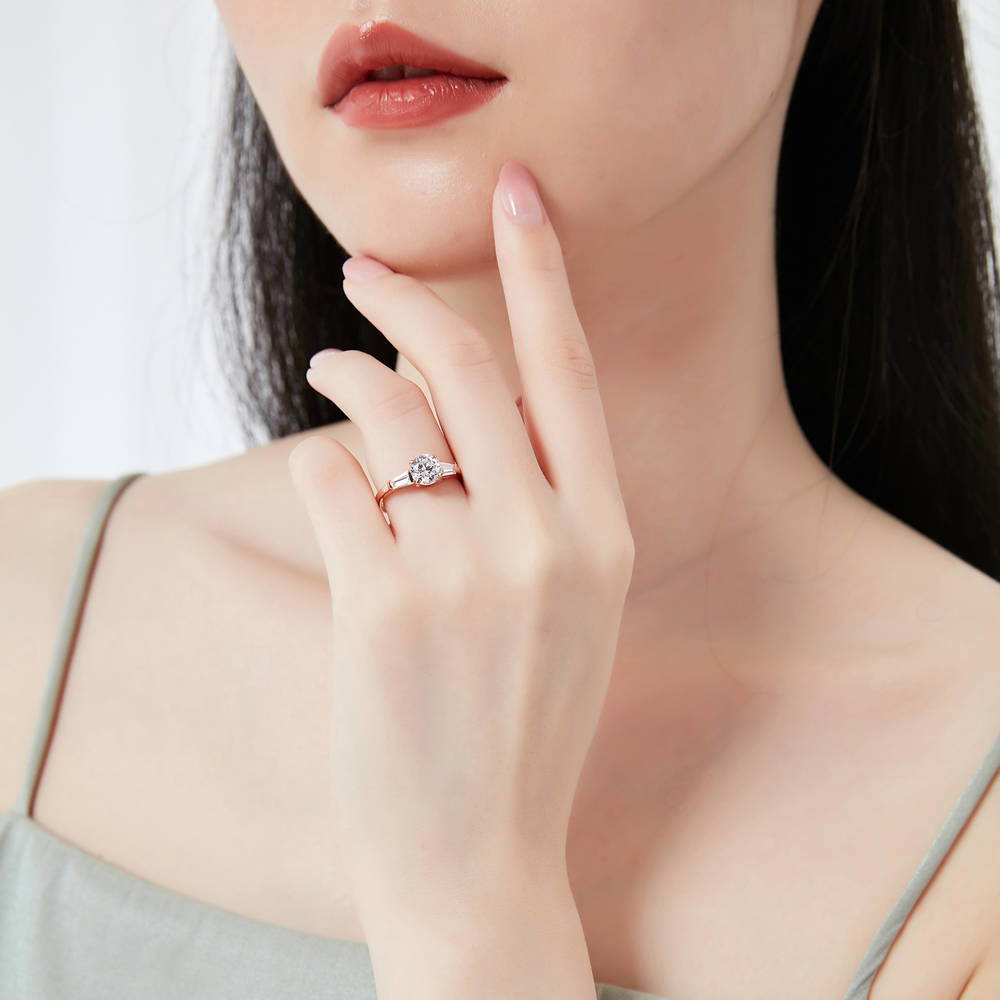 Model wearing Solitaire 1ct CZ Ring in Rose Gold Plated Sterling Silver, 2 of 8