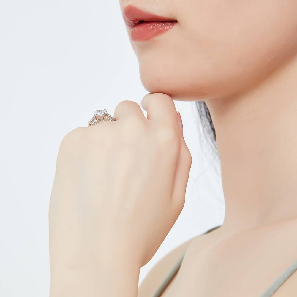 Model wearing 3-Stone 2.1ct Emerald Cut CZ Ring in Sterling Silver, 14 of 18