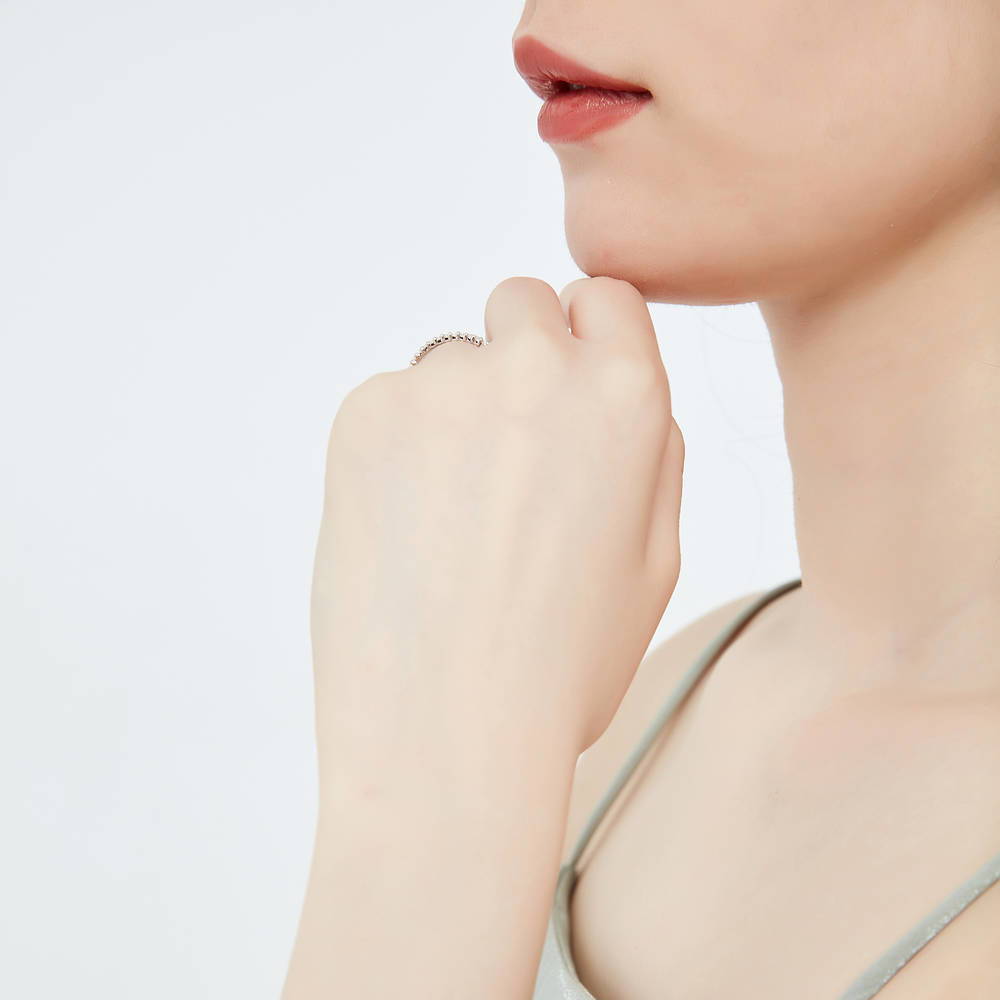 Model wearing Pave CZ Eternity Ring in Sterling Silver, 9 of 10