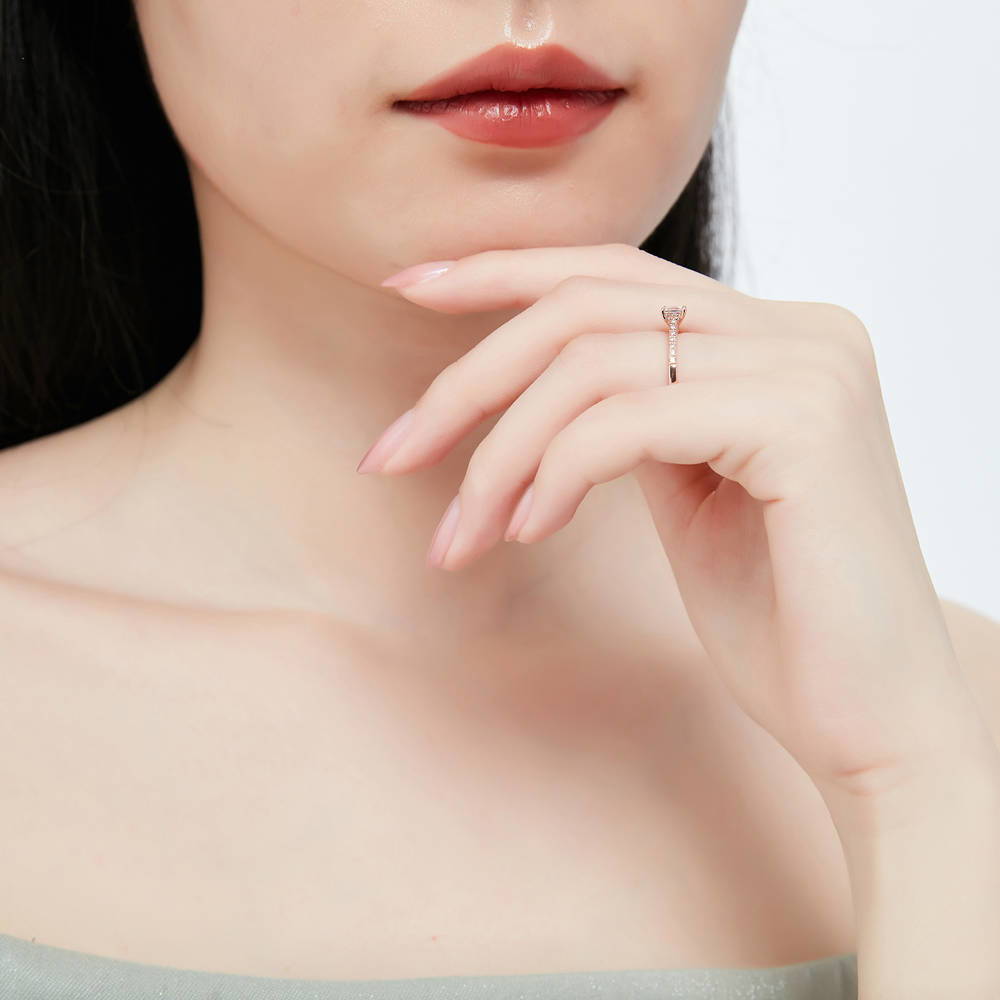 Model wearing Solitaire Princess CZ Ring in Rose Gold Plated Sterling Silver, 6 of 8
