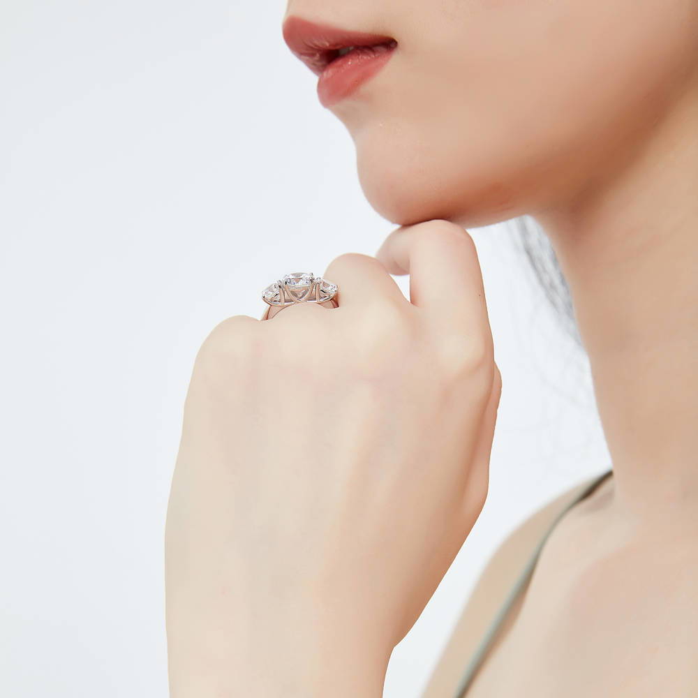 Model wearing 3-Stone Criss Cross Round CZ Ring Set in Sterling Silver, 13 of 17