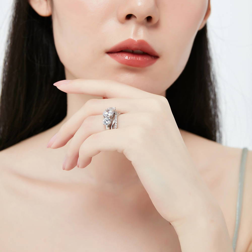 Model wearing 3-Stone Criss Cross Round CZ Ring Set in Sterling Silver, 8 of 17
