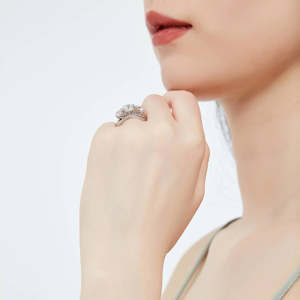 Model wearing 3-Stone Criss Cross Round CZ Ring Set in Sterling Silver, 7 of 17