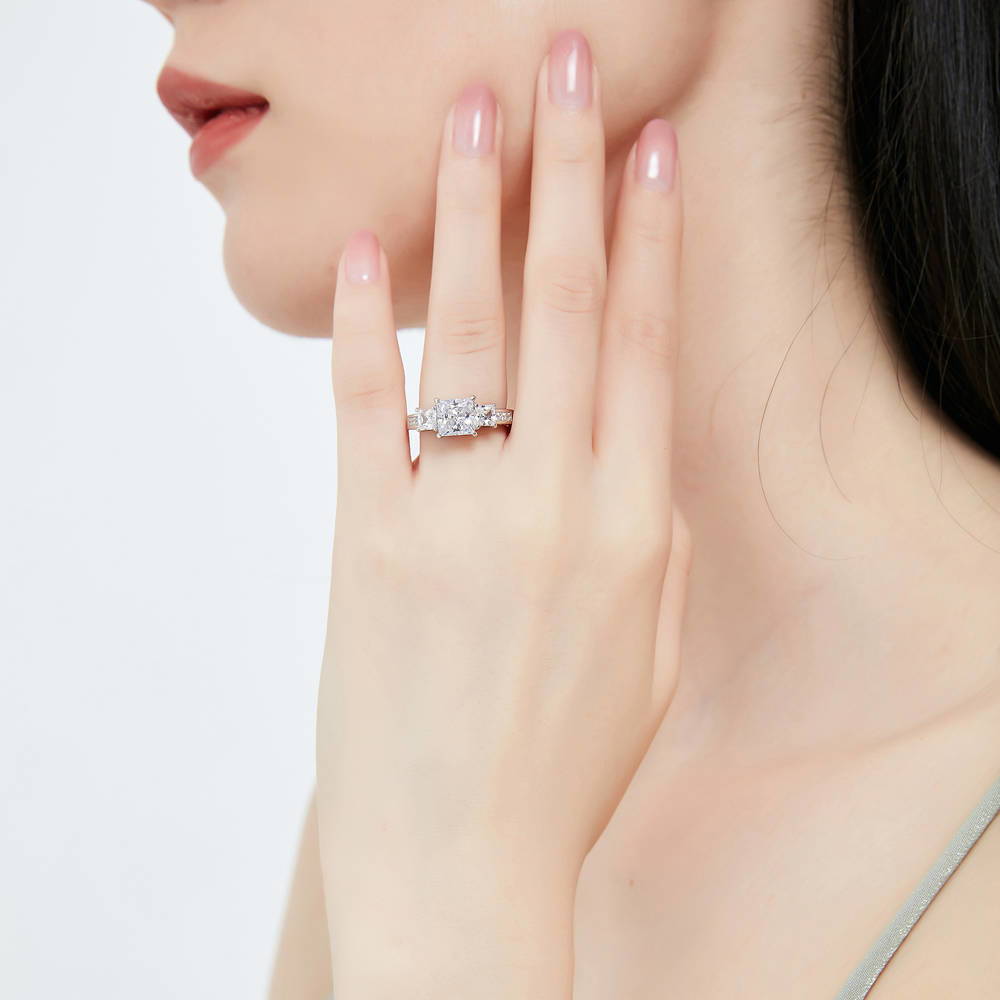 Model wearing 3-Stone Princess CZ Ring Set in Sterling Silver, 9 of 15