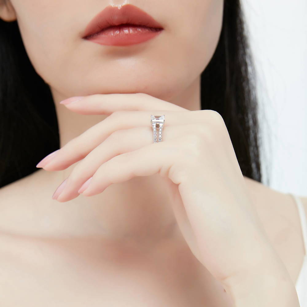 Model wearing Solitaire 2ct Princess CZ Split Shank Ring Set in Sterling Silver, 13 of 15