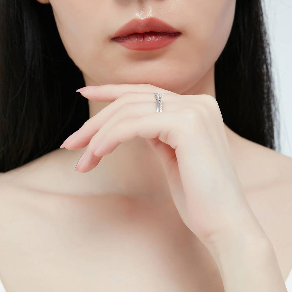Model wearing Solitaire 0.4ct Princess CZ Ring in Sterling Silver, 11 of 15