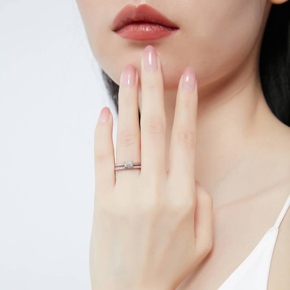 Model wearing East-West Solitaire CZ Ring Set in Sterling Silver, 2 of 14