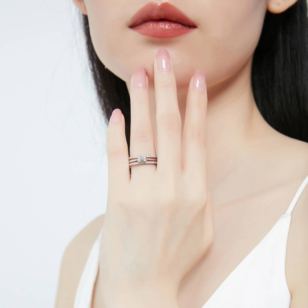 Model wearing East-West Solitaire CZ Ring Set in Sterling Silver, 2 of 13