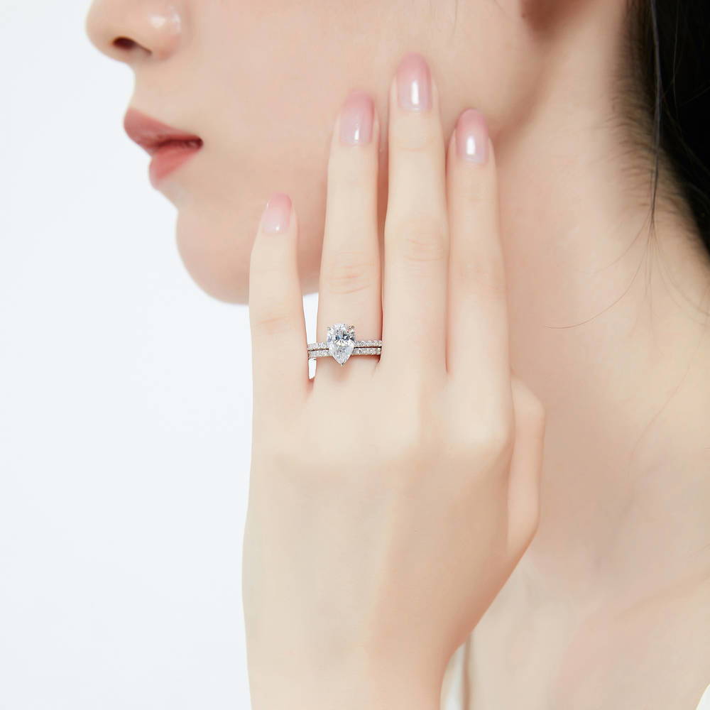 Model wearing Hidden Halo Solitaire CZ Ring Set in Sterling Silver, 2 of 12
