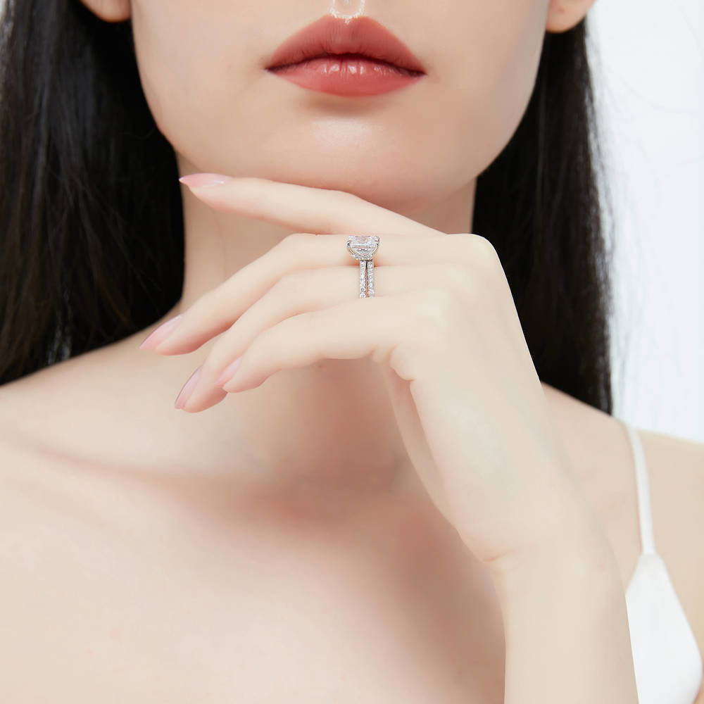 Model wearing Hidden Halo Solitaire CZ Ring Set in Sterling Silver, 7 of 12