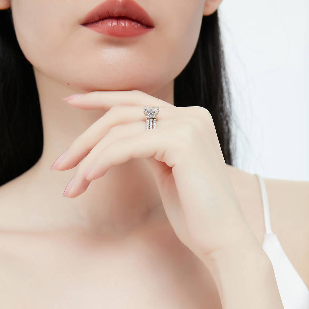 Model wearing Hidden Halo Solitaire CZ Ring Set in Sterling Silver, 8 of 13