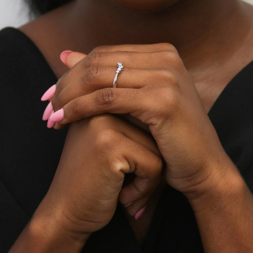 Model wearing Wishbone 5-Stone CZ Curved Band in Sterling Silver