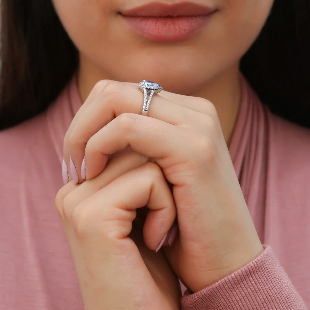 Model wearing Halo Blue Pear CZ Split Shank Ring in Sterling Silver, 7 of 10