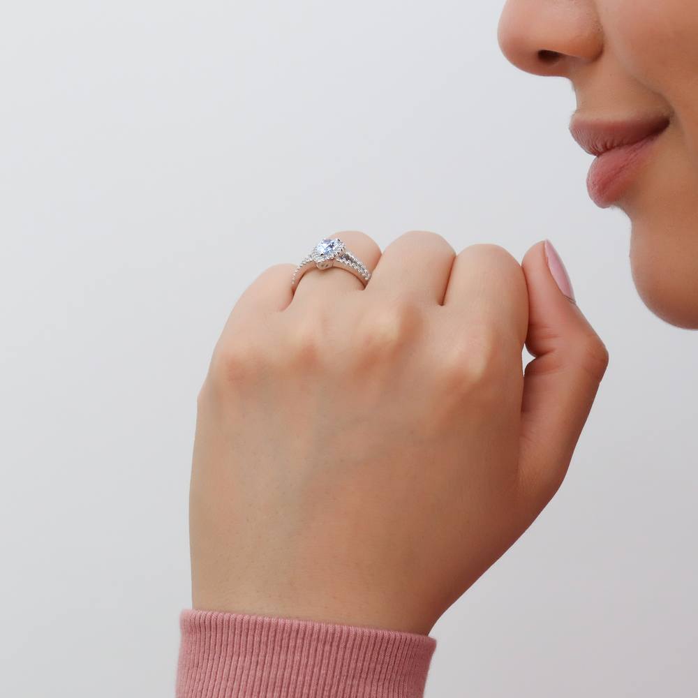 Model wearing Halo Blue Pear CZ Split Shank Ring in Sterling Silver, 3 of 9