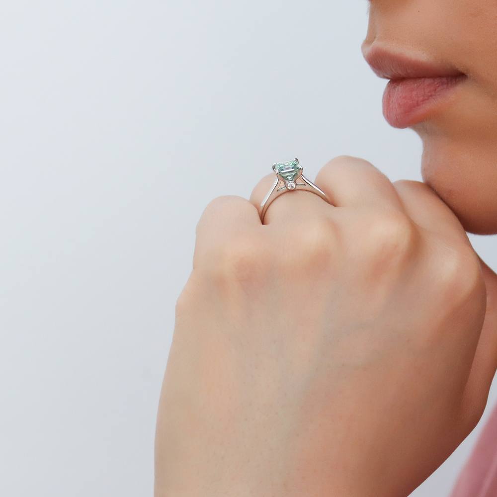 Model wearing Solitaire 1.2ct Green Princess CZ Ring in Sterling Silver, 3 of 9