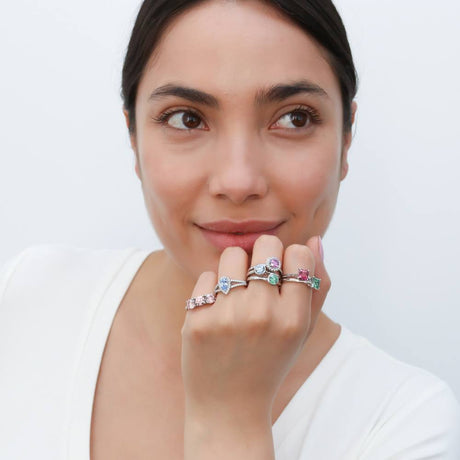 Model Wearing 3-Stone Ring, Halo Ring, Halo Split Shank Ring, Solitaire Ring