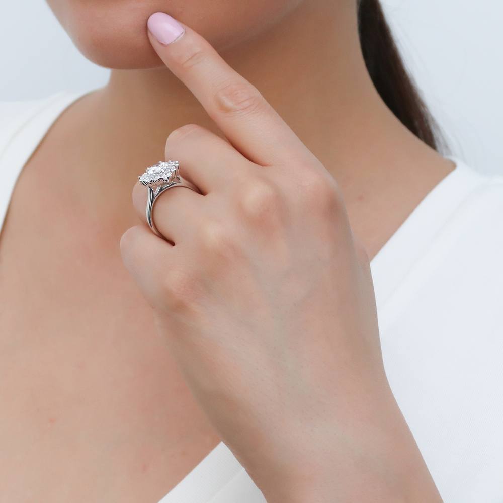 Model wearing Halo Pear Cut CZ Ring in Sterling Silver, 11 of 13