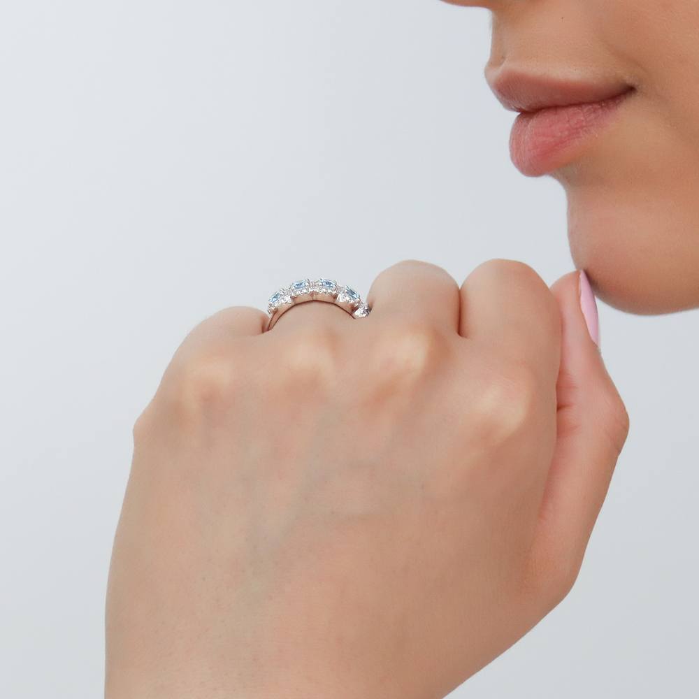 Model wearing 5-Stone Simulated Aquamarine CZ Ring in Sterling Silver, 3 of 9