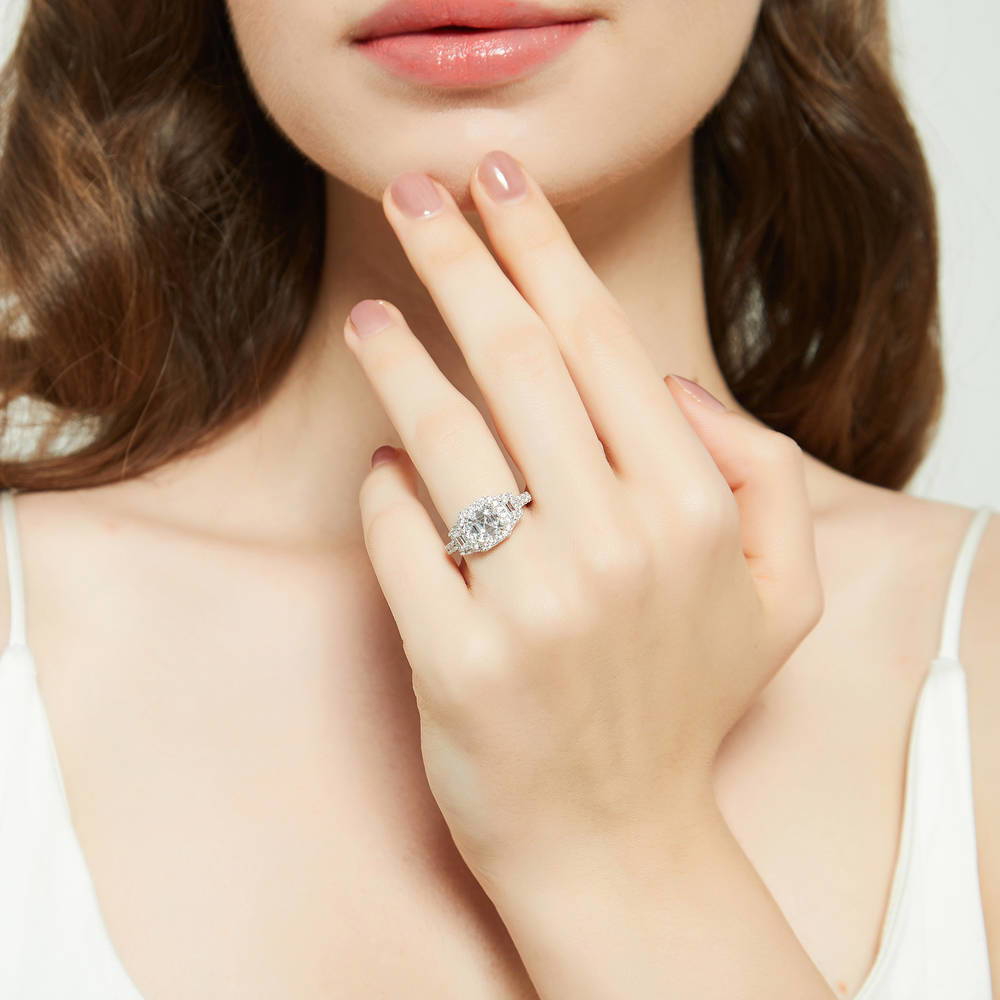 Model wearing Halo 3-Stone Asscher CZ Statement Ring in Sterling Silver, 3 of 12