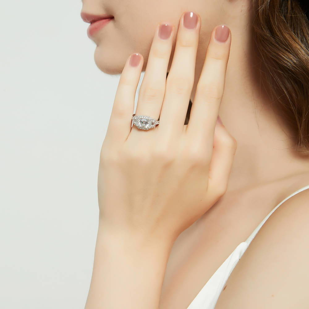 Model wearing Halo 3-Stone Asscher CZ Statement Ring in Sterling Silver, 2 of 12