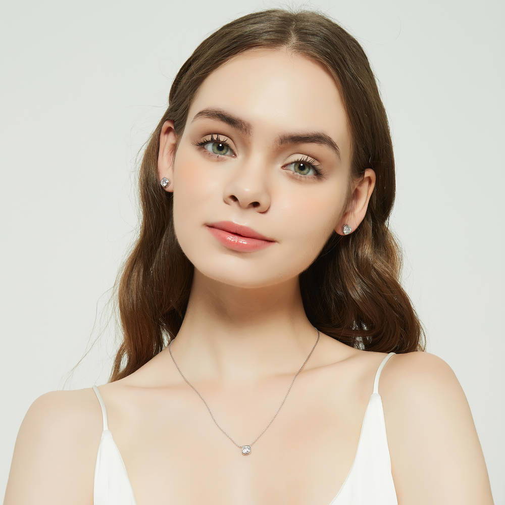 Model wearing Solitaire 1.25ct Bezel Cushion CZ Necklace in Sterling Silver, 3 of 6