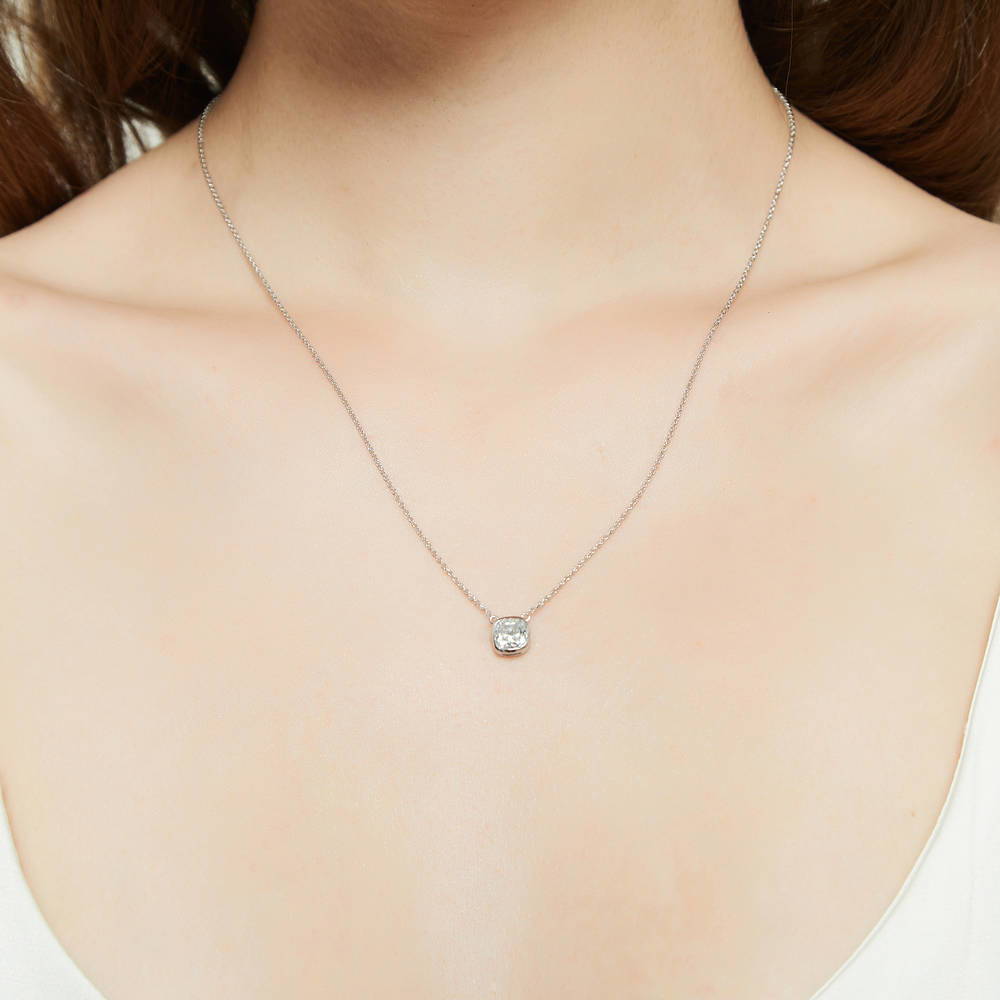 Model wearing Solitaire 1.25ct Bezel Cushion CZ Necklace in Sterling Silver, 2 of 6