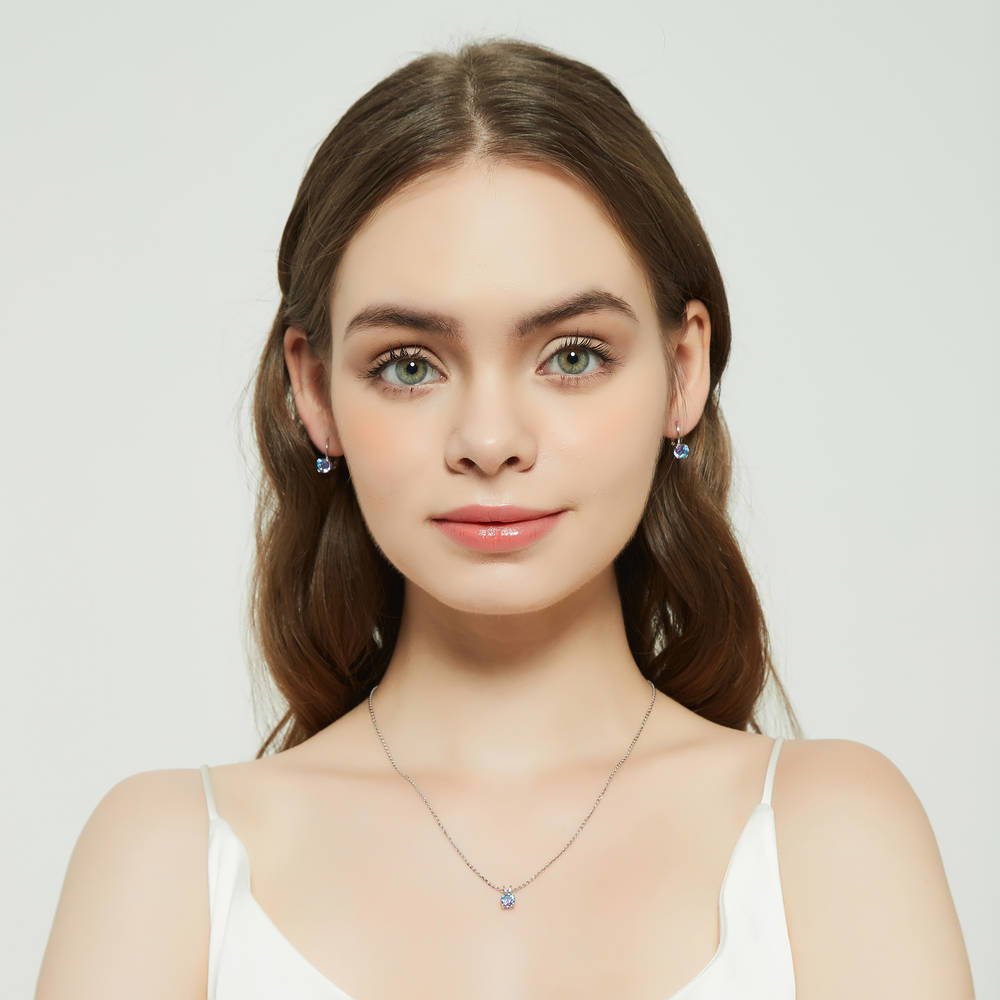 Model wearing Kaleidoscope Solitaire CZ Pendant Necklace in Sterling Silver, 18 of 19