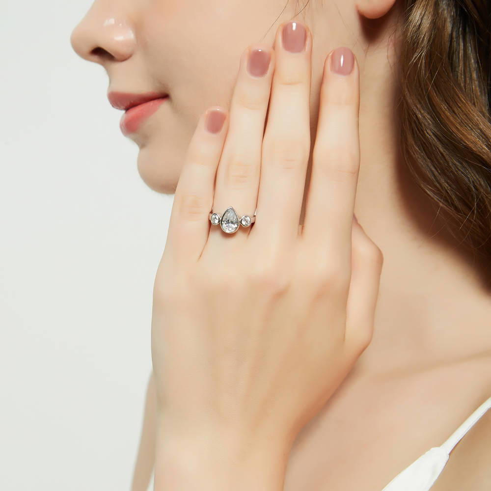 Model wearing 3-Stone 1.3ct Pear CZ Ring in Sterling Silver, 6 of 10