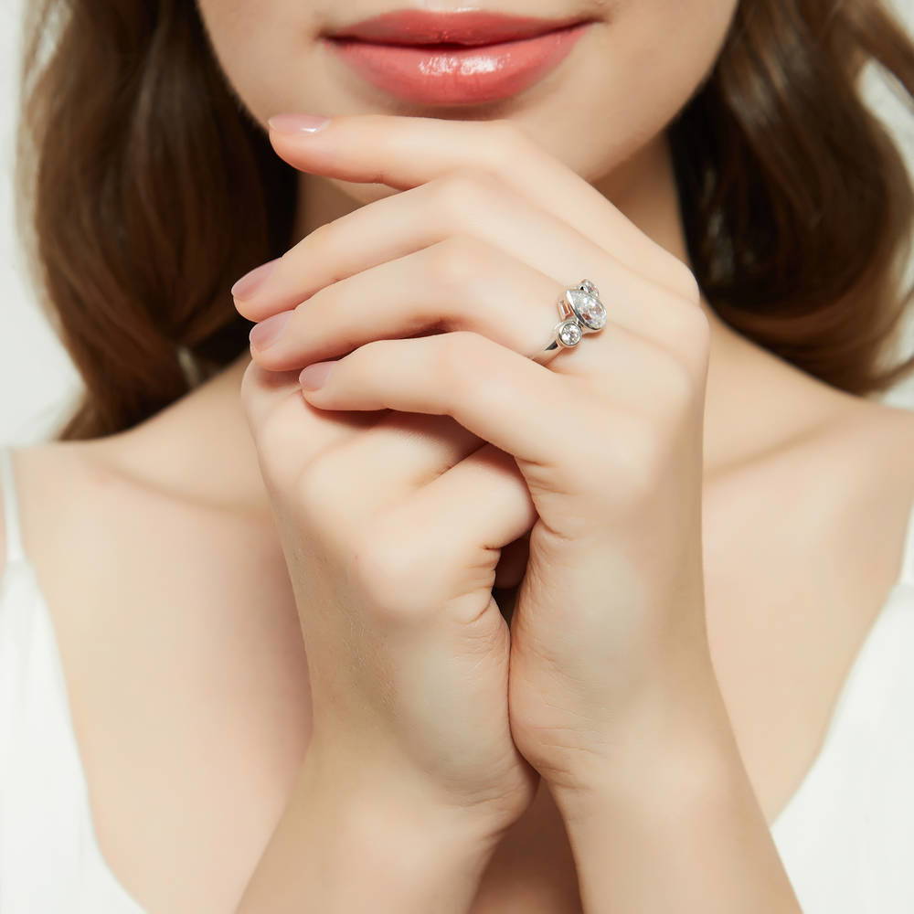 Model wearing 3-Stone 1.3ct Pear CZ Ring in Sterling Silver, 7 of 10