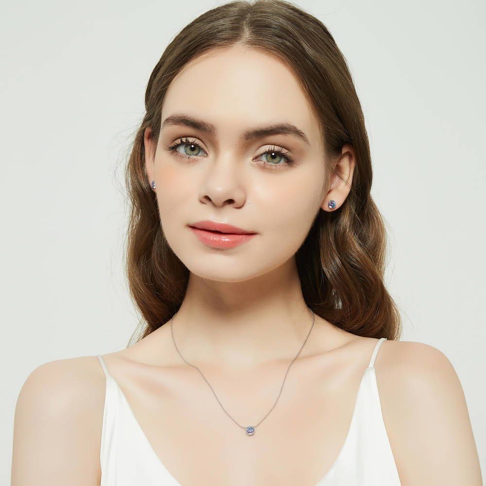 Model wearing Solitaire Bezel Set Round CZ Pendant Necklace in Sterling Silver 0.8ct, 15 of 16