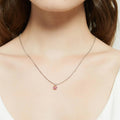 Model wearing Kaleidoscope Solitaire 0.8ct CZ Necklace in Sterling Silver, Red Orange Color