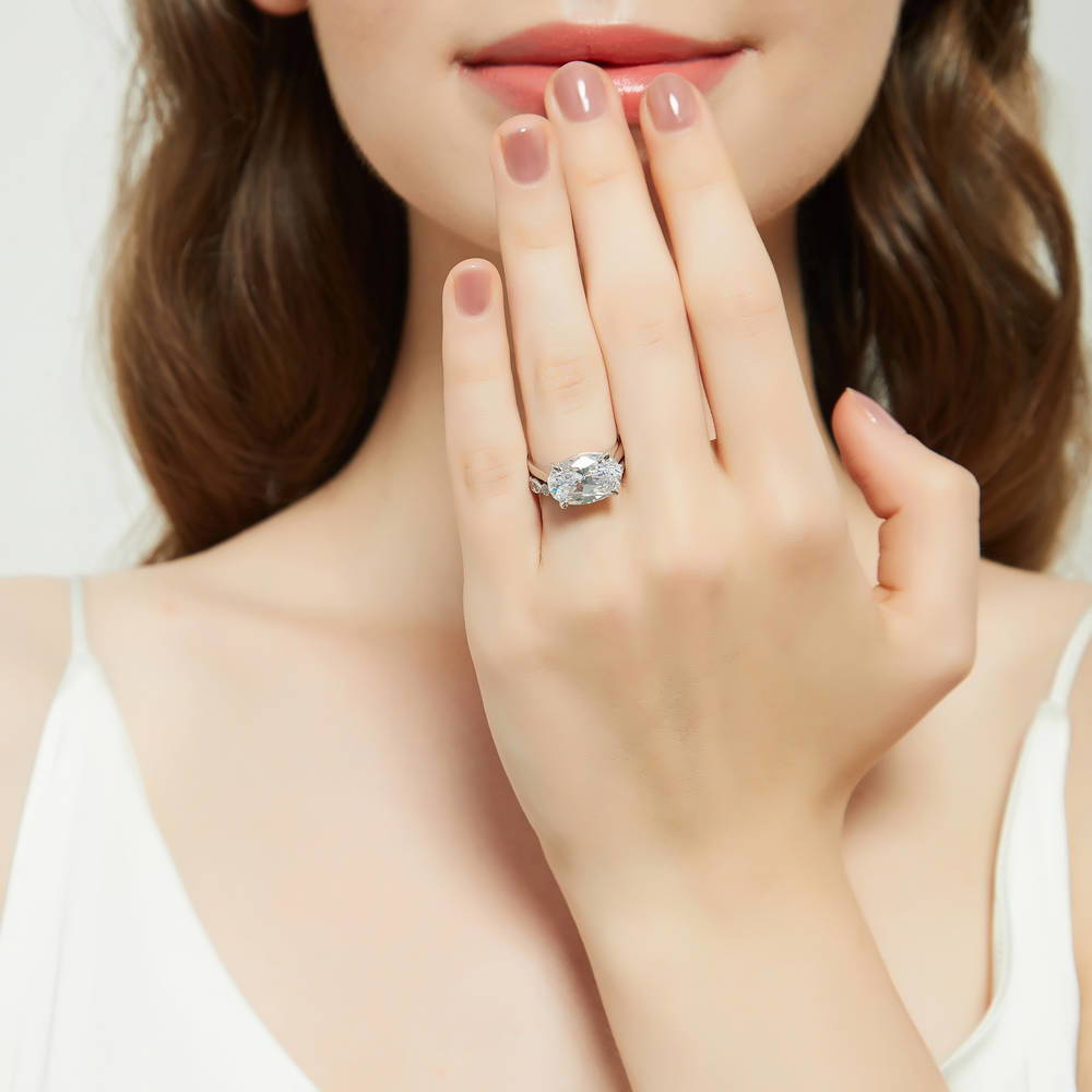 Model wearing East-West Solitaire CZ Ring Set in Sterling Silver, 2 of 18