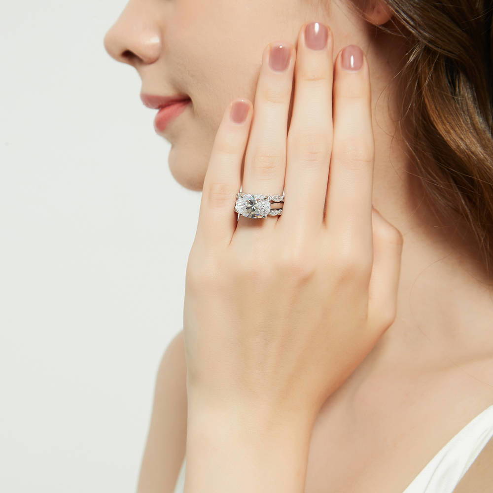 Model wearing East-West Solitaire CZ Ring Set in Sterling Silver, 5 of 18