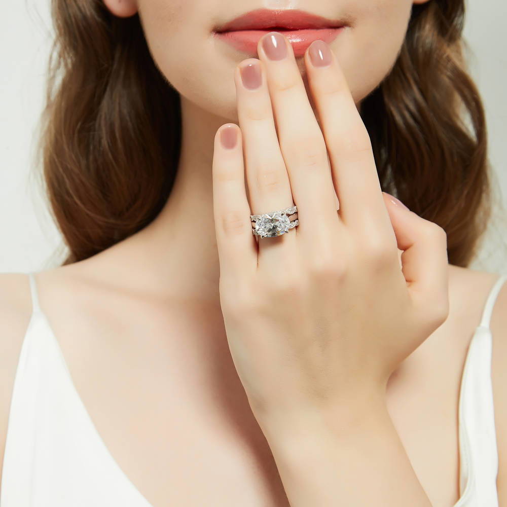 Model wearing Solitaire Art Deco East-West Oval CZ Ring Set in Sterling Silver, 2 of 20