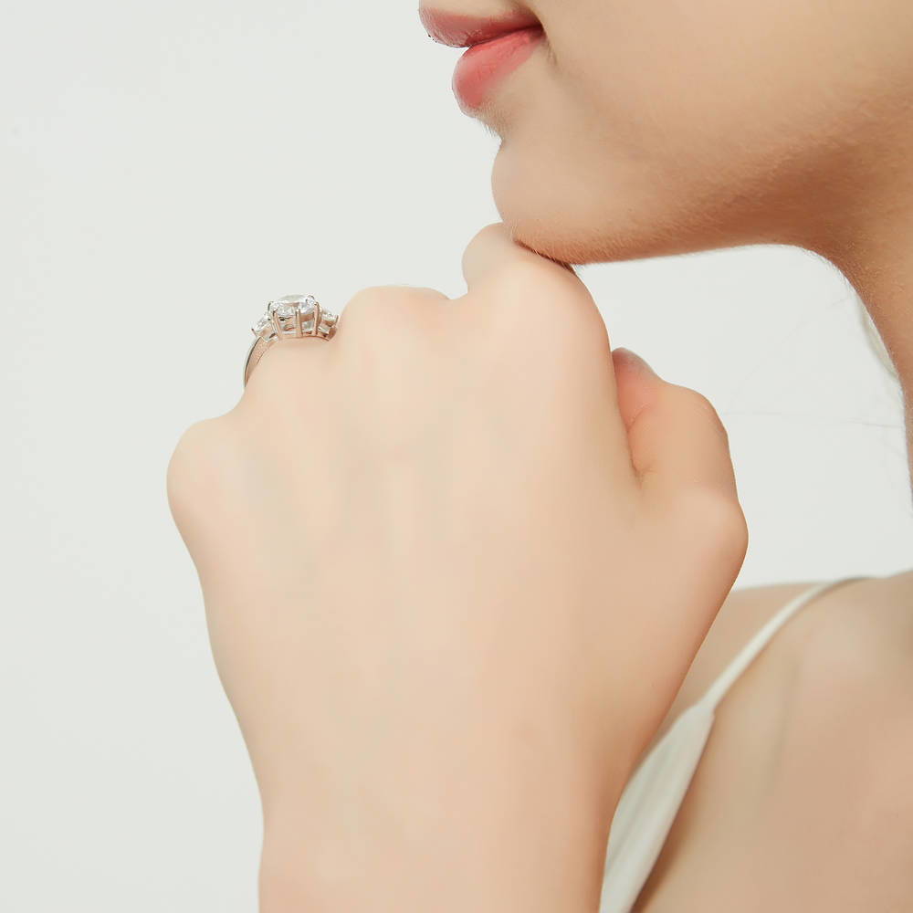 Model wearing 3-Stone 7-Stone Round CZ Ring Set in Sterling Silver, 12 of 18