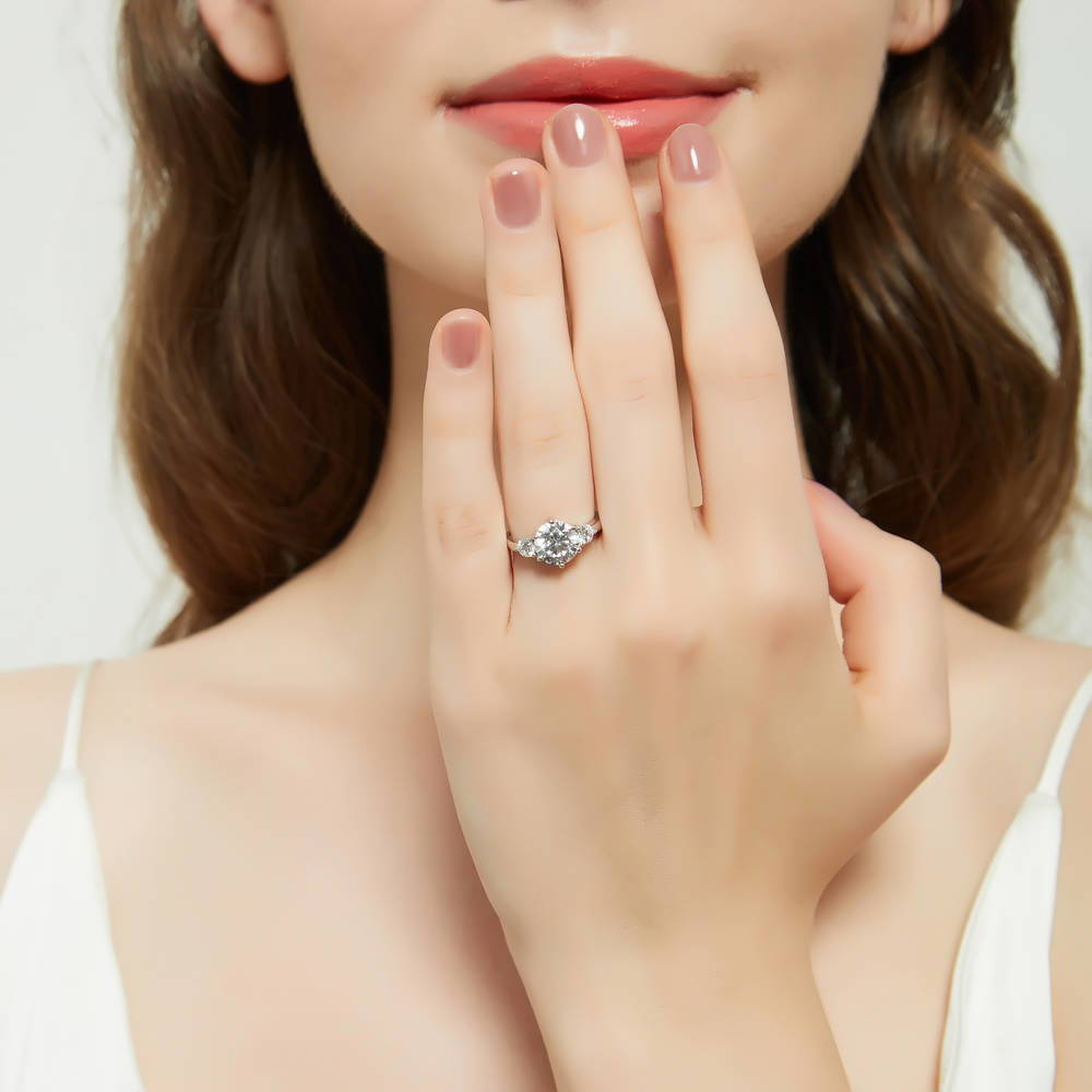 Model wearing 3-Stone Round CZ Ring in Sterling Silver, 2 of 12
