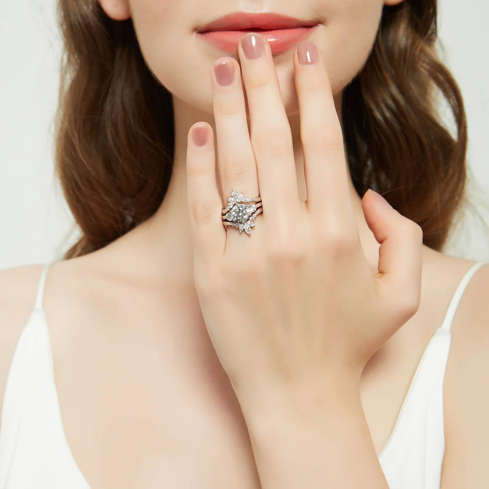 Model wearing 3-Stone 7-Stone Round CZ Ring Set in Sterling Silver, 2 of 18