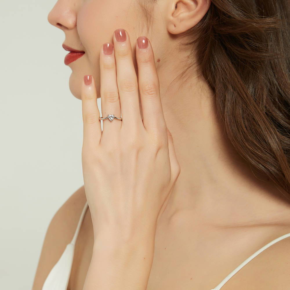 Model wearing Solitaire Heart 0.4ct Heart CZ Ring in Sterling Silver, 3 of 9