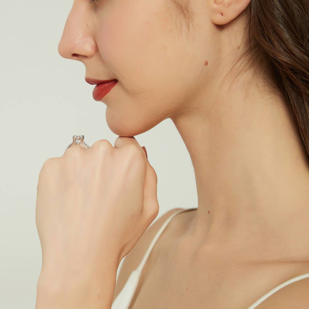 Model wearing Solitaire 2.5ct Oval CZ Ring in Sterling Silver, 7 of 9