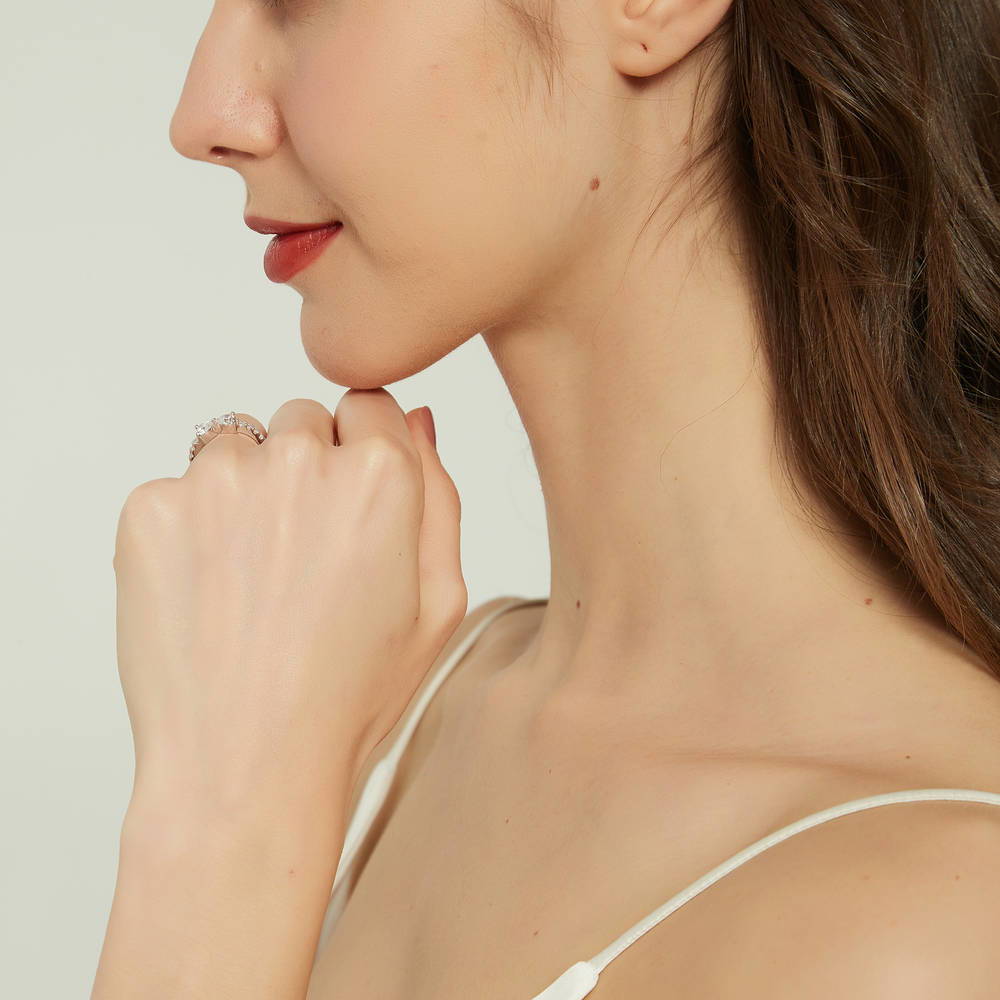 Model wearing Bow Tie Heart CZ Ring in Sterling Silver, 7 of 9
