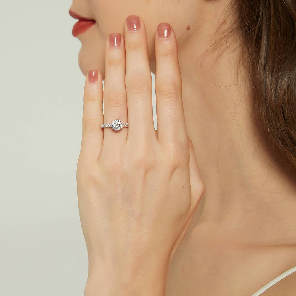 Model wearing 5-Stone Solitaire CZ Ring Set in Sterling Silver