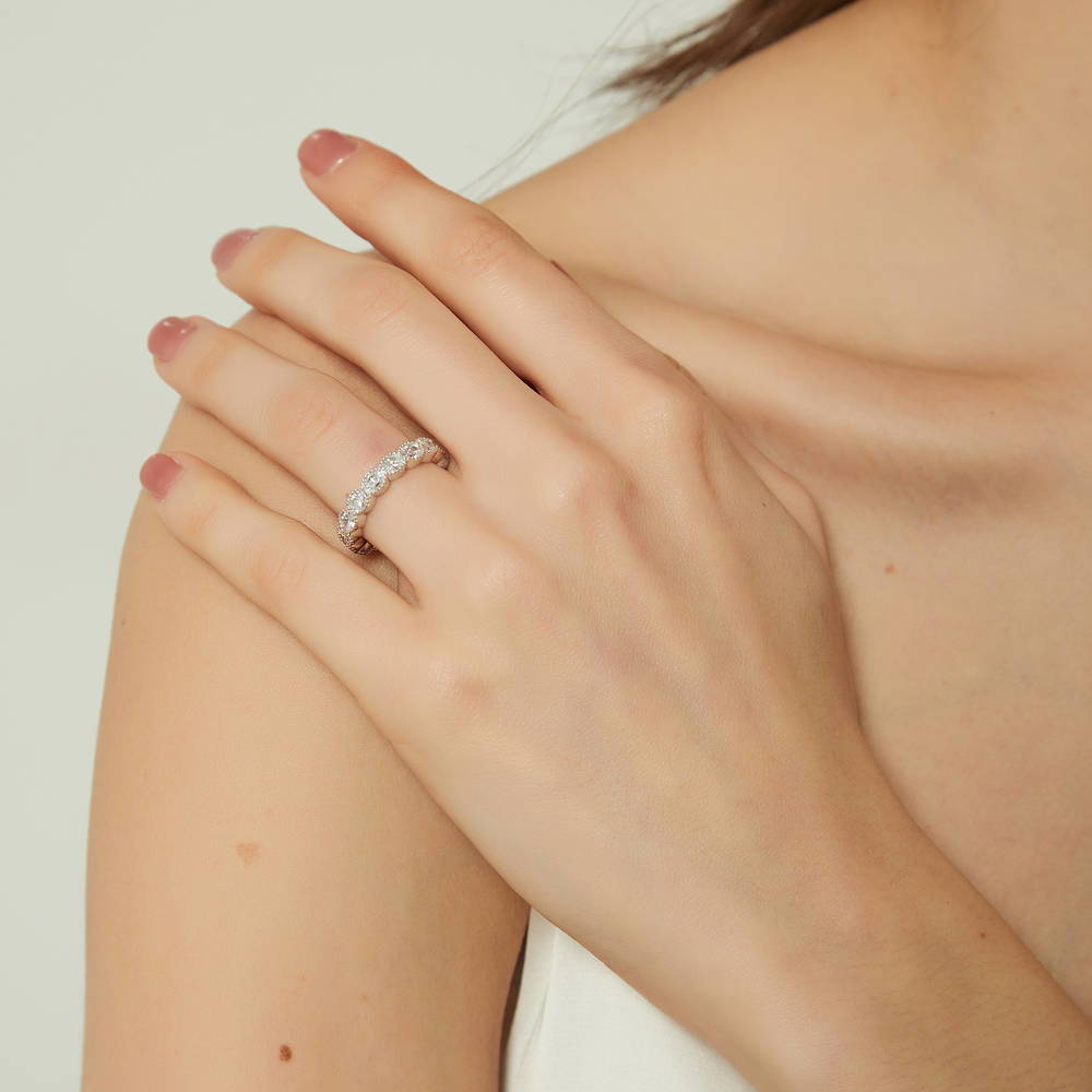 Model wearing East-West Milgrain Bezel Oval CZ Eternity Ring in Sterling Silver, 3 of 8