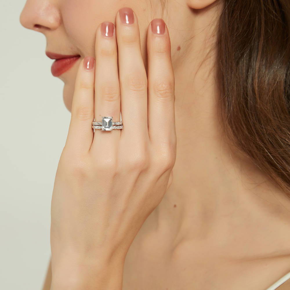Model wearing Solitaire Art Deco 2.1ct Emerald Cut CZ Ring Set in Sterling Silver, 5 of 18