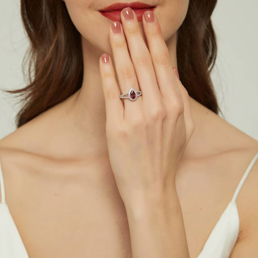Model wearing Halo Red Pear CZ Split Shank Ring in Sterling Silver, 2 of 10